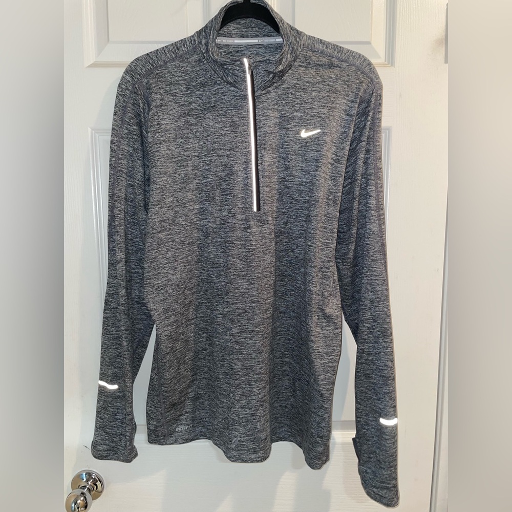 Nike quarte-zip Dry Fit Running long sleeved pullover. Women’s size XL.